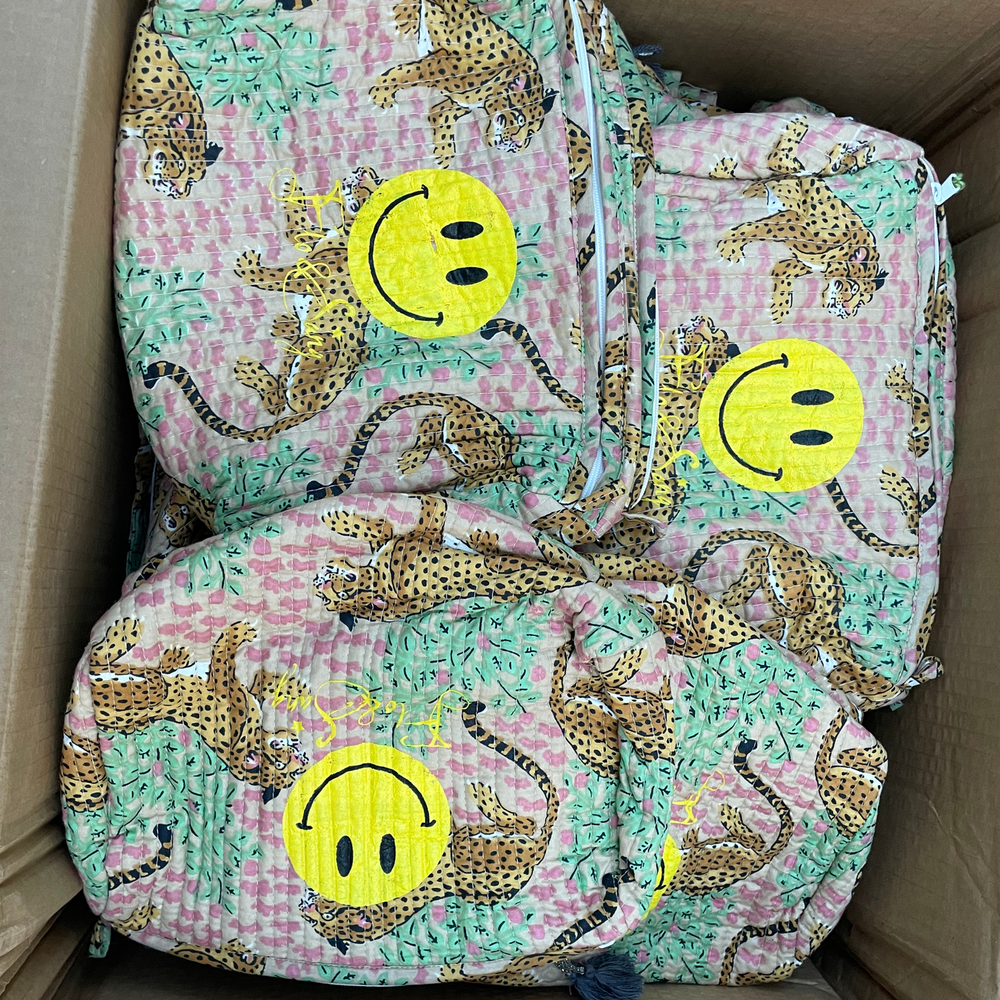 Cotton wash bag smiley face logo